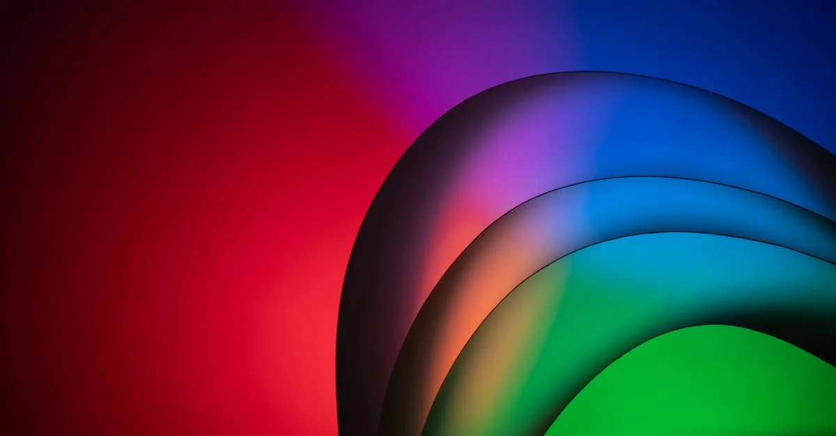 Design vibrant et coloré avec un dégradé abstrait et des formes courbes pour des arrière-plans créatifs.